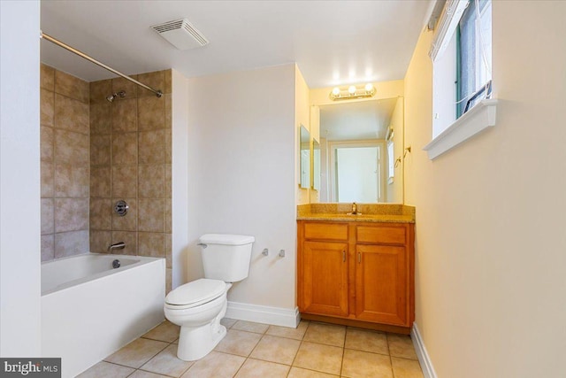 bathroom featuring visible vents, toilet, tub / shower combination, vanity, and tile patterned floors