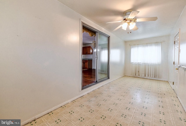 empty room featuring ceiling fan