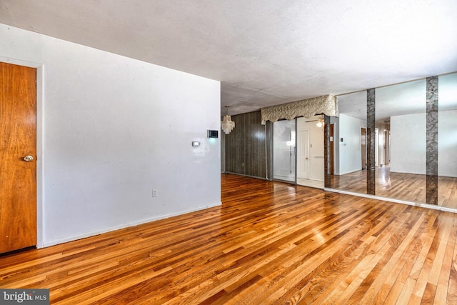 spare room featuring hardwood / wood-style floors