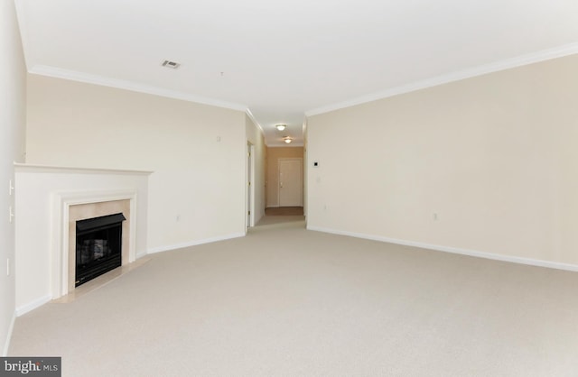 unfurnished living room with a fireplace, ornamental molding, and light carpet