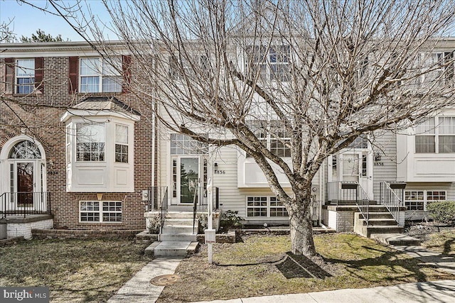 multi unit property featuring brick siding