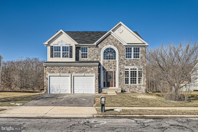 front of property featuring a garage