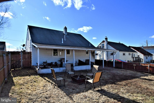 back of property featuring a patio area