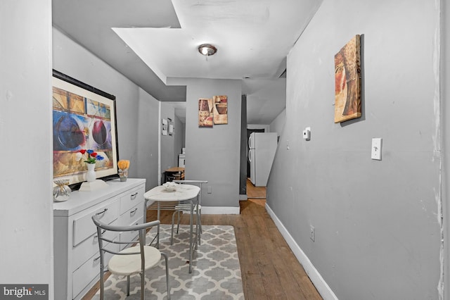 home office featuring dark wood-type flooring