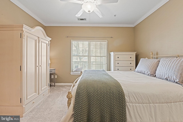 bedroom with ornamental molding, light carpet, baseboards, and a ceiling fan