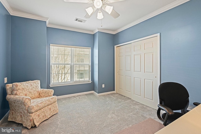 carpeted office space with baseboards, visible vents, ceiling fan, and crown molding