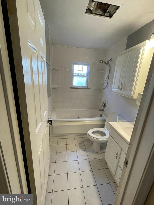 bathroom with toilet, shower / tub combination, tile patterned flooring, and vanity