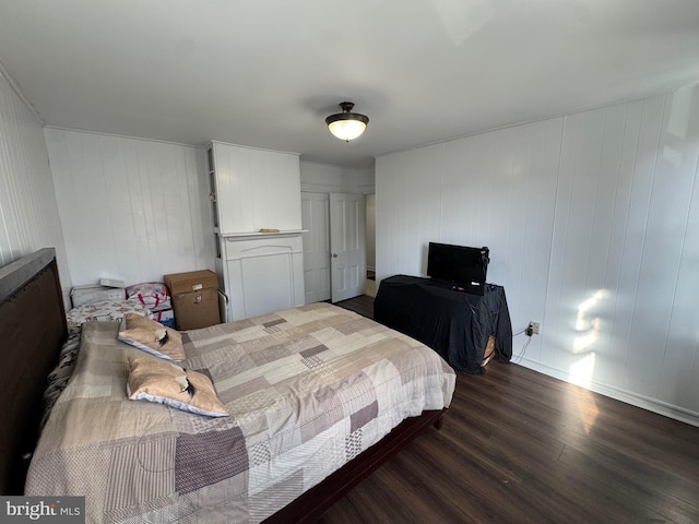 bedroom with wood finished floors