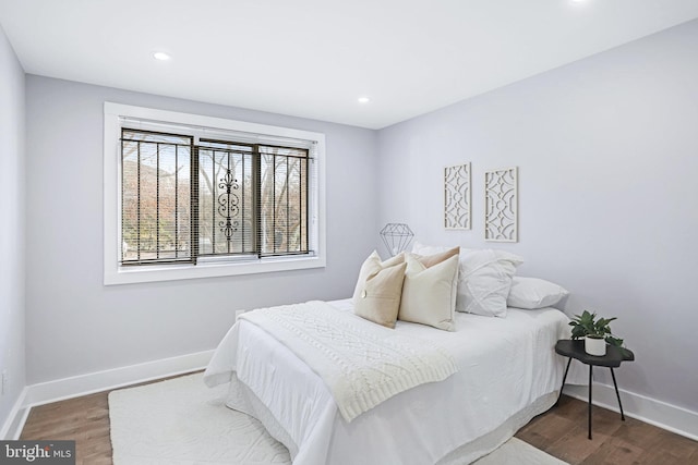 bedroom featuring hardwood / wood-style floors