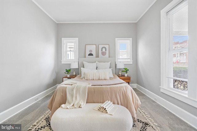 carpeted bedroom with ornamental molding and multiple windows