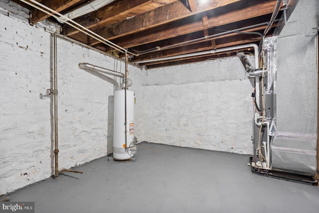 basement with heating unit and gas water heater