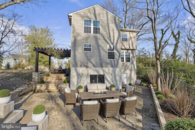 back of house with outdoor dining area, fence, a patio area, and a pergola