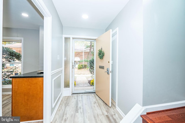 foyer entrance featuring light hardwood / wood-style flooring