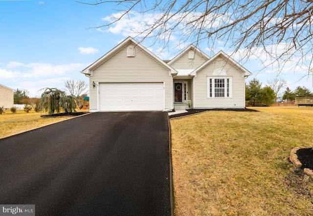 single story home with driveway, a front lawn, and an attached garage