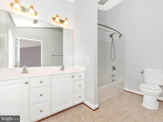 full bathroom with tile patterned flooring, toilet, vanity, and tiled shower / bath