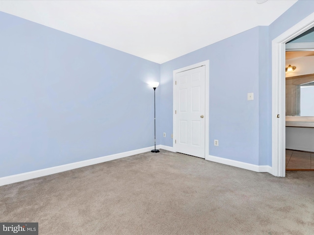 unfurnished bedroom with carpet floors