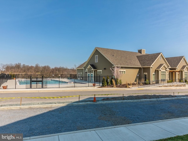 exterior space featuring a community pool