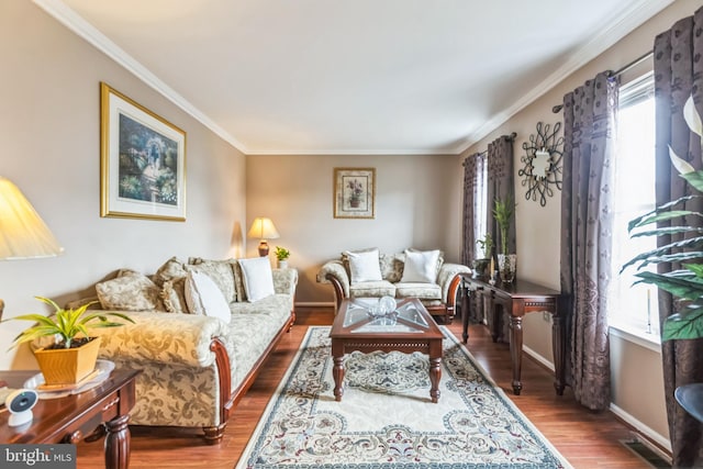 living room featuring dark hardwood / wood-style flooring and crown molding