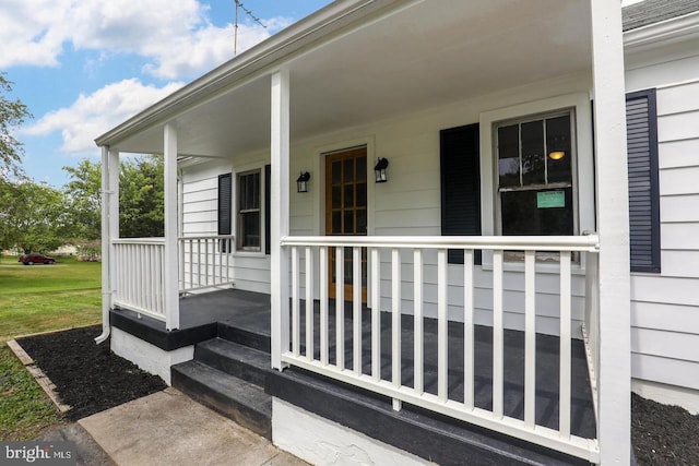 doorway to property with a porch