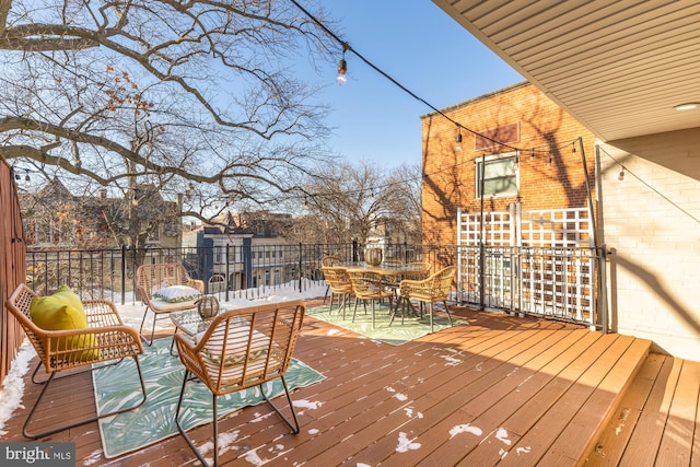 deck with outdoor dining space