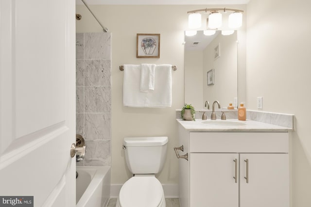 bathroom with vanity, visible vents, baseboards, toilet, and shower / bath combination