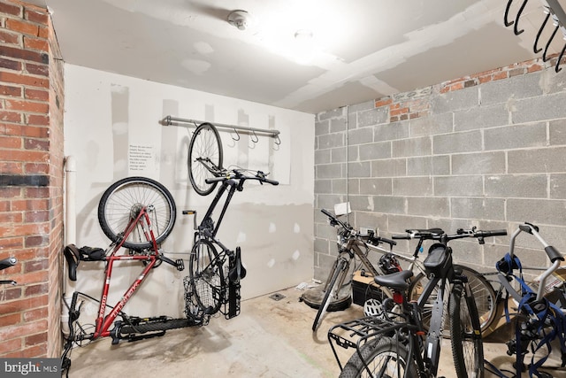 exercise room with concrete block wall