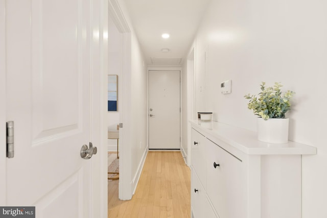 hallway with light wood-type flooring