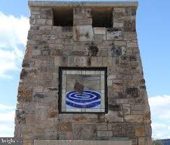 exterior details featuring stone siding