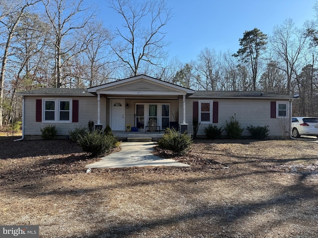 ranch-style home featuring covered porch