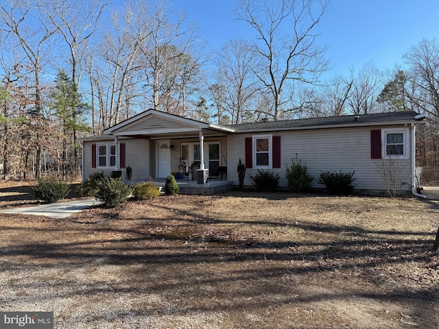 single story home featuring a porch