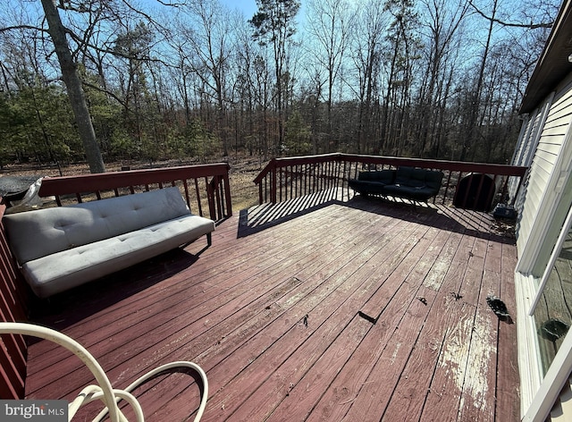 wooden deck featuring an outdoor hangout area