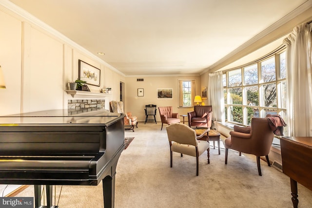 living area featuring visible vents, crown molding, and light colored carpet