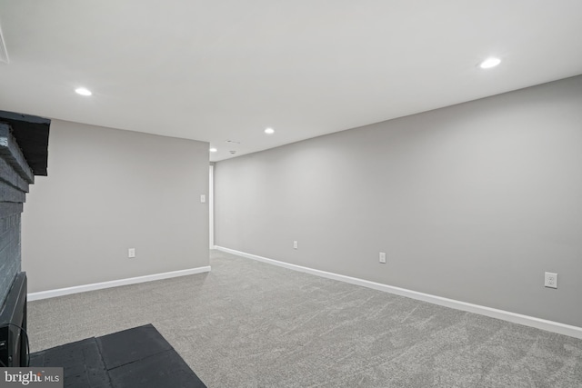 workout room featuring carpet, baseboards, and recessed lighting