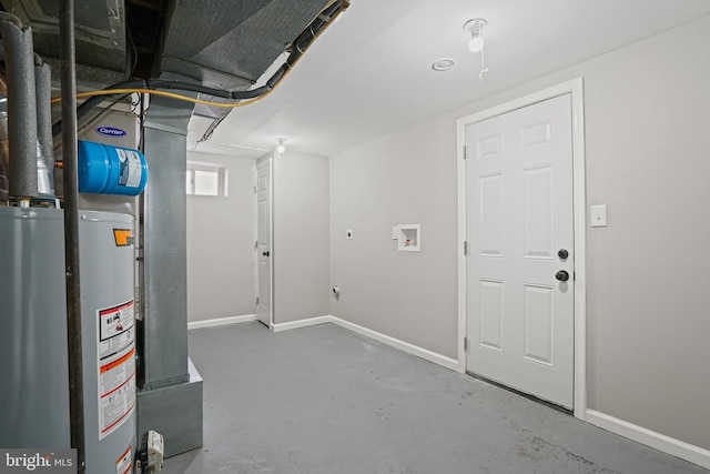 utility room featuring gas water heater