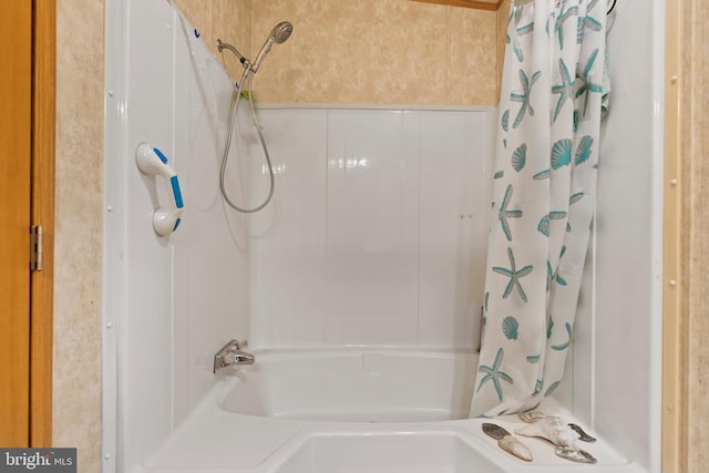 full bath with shower / bathtub combination with curtain