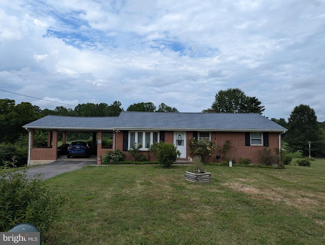 ranch-style house with a front lawn, driveway, a carport, and brick siding