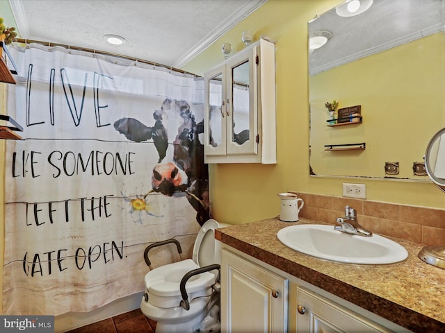 full bathroom with a textured ceiling, curtained shower, toilet, vanity, and ornamental molding