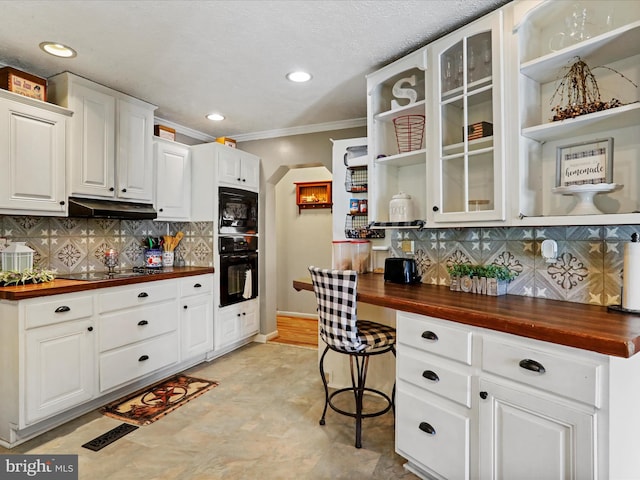 kitchen featuring open shelves, butcher block countertops, black appliances, and under cabinet range hood