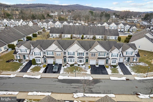 bird's eye view with a mountain view and a residential view