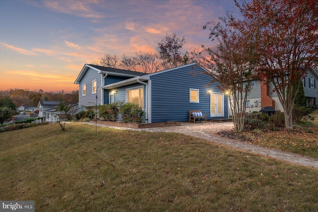 exterior space with a front lawn