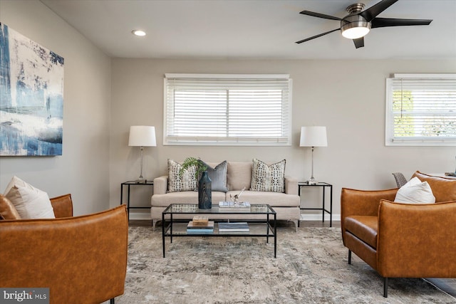 living room with recessed lighting, wood finished floors, and a ceiling fan