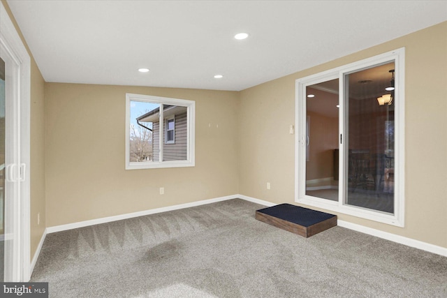 unfurnished room featuring carpet flooring, recessed lighting, and baseboards