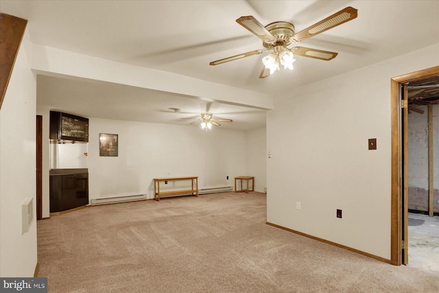 interior space with light carpet, baseboard heating, baseboards, and a ceiling fan