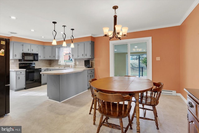 dining room with a notable chandelier, recessed lighting, baseboards, and ornamental molding