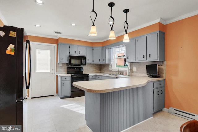 kitchen with visible vents, a peninsula, gray cabinetry, black appliances, and a baseboard heating unit