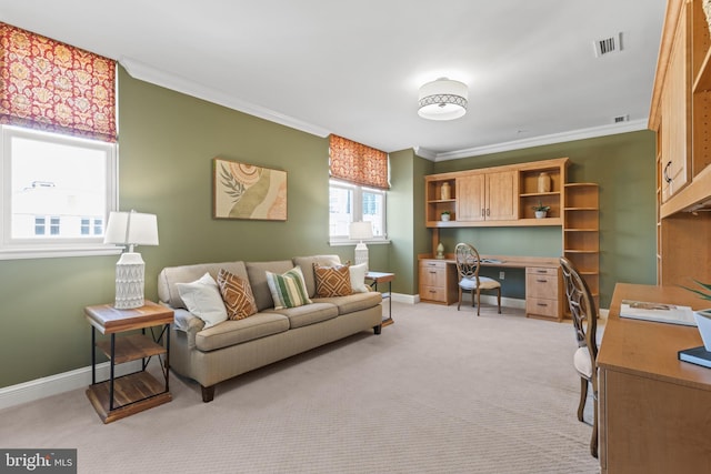 living room with baseboards, light carpet, visible vents, and crown molding