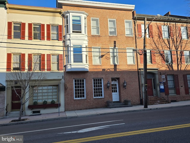 view of building exterior featuring entry steps