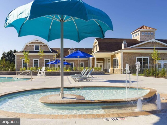 14 Bowers Dr Unit 1, Ocean View, DE 19970 - community pool featuring a patio and a hot tub