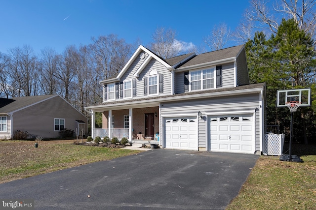 view of front of house featuring aphalt driveway, brick siding, a porch, an attached garage, and a front lawn