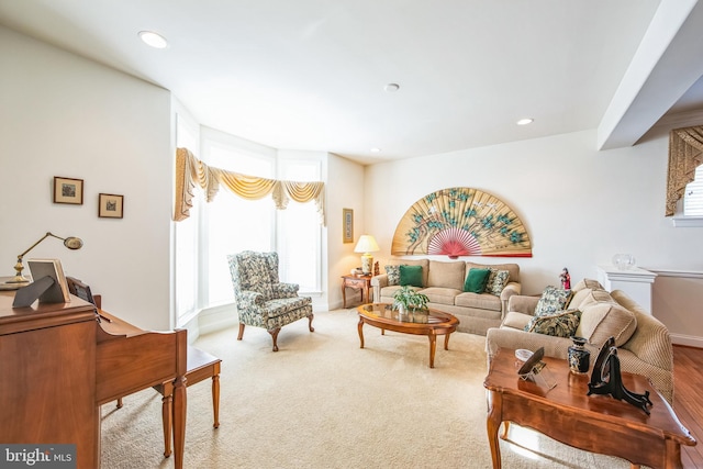 living room with recessed lighting and carpet flooring